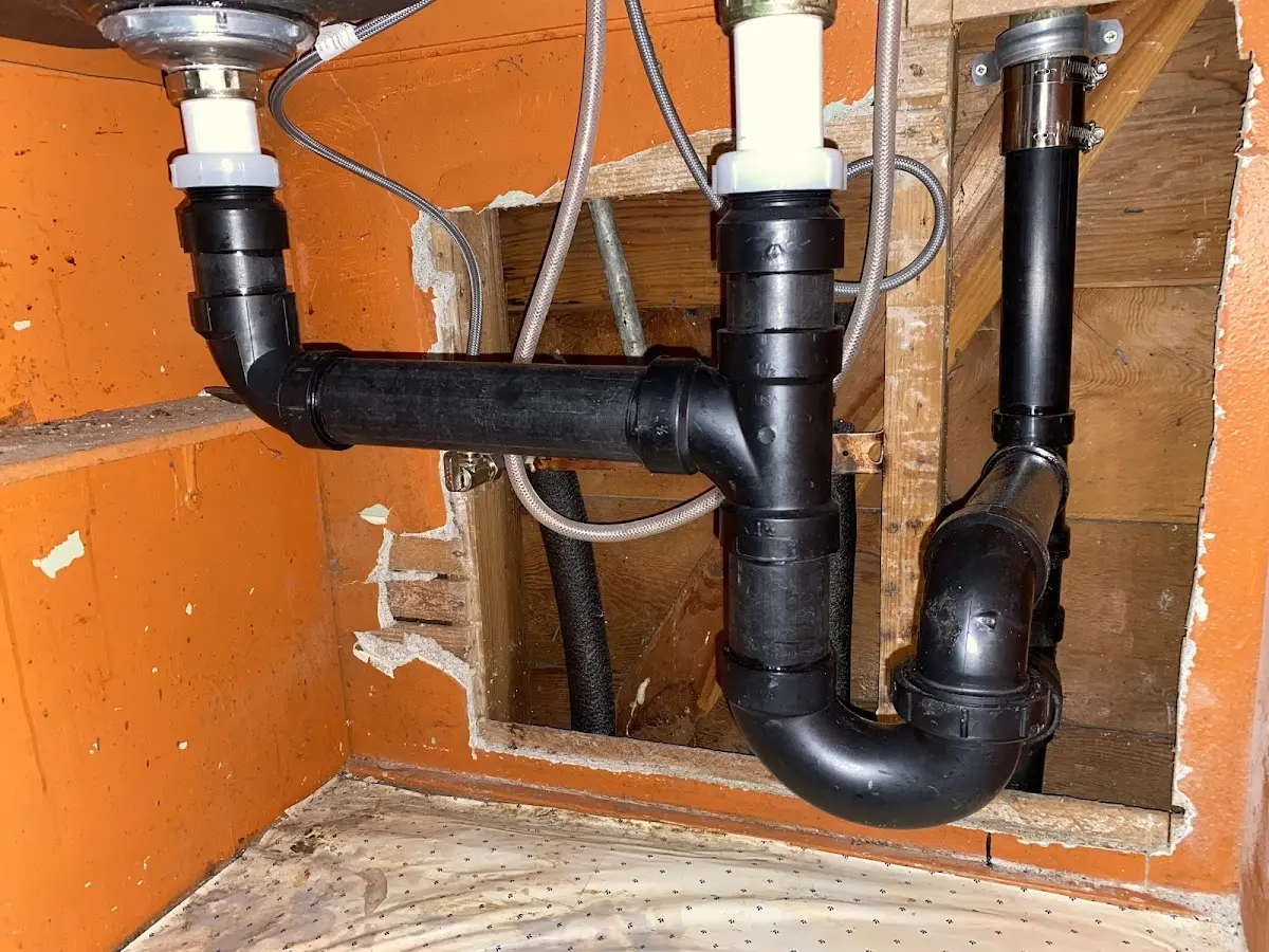 Professional Garbage Disposal Repair equipment and tools on the job in Sachse